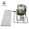 Gambling wooden bingo set for leisure time with bingo pieces and cage